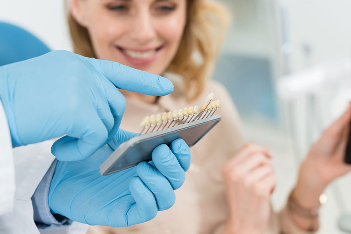 Patient select the color of teeth