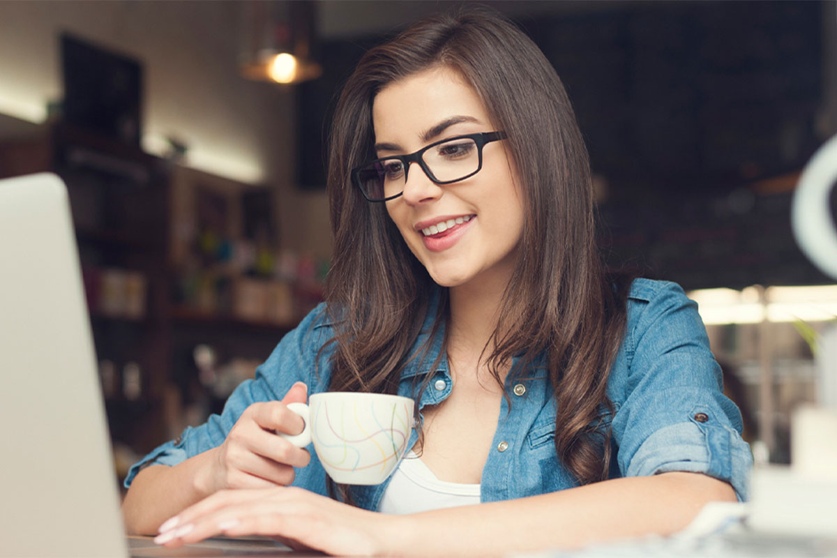 Beautiful woman smiling with laptop